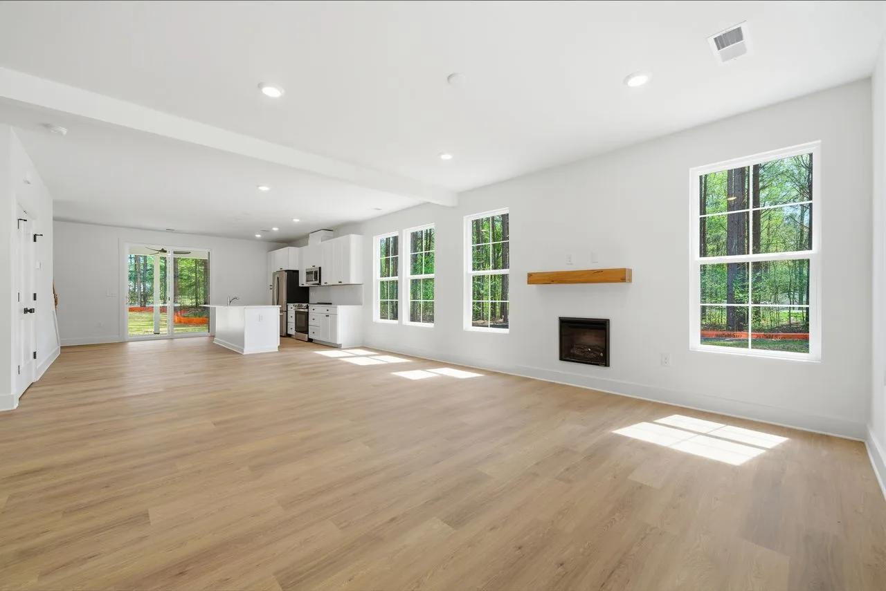 Open-concept great room with 9-foot ceilings and fireplace — 1412 Quiver Way, York SC