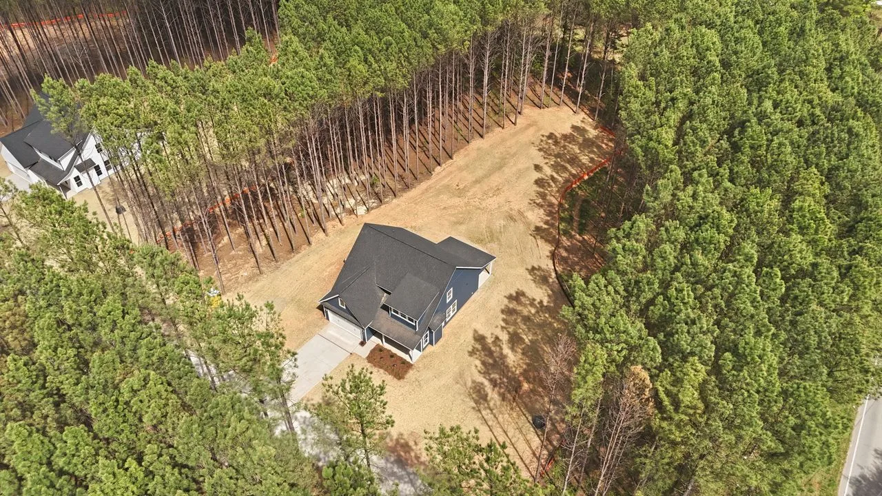 Aerial view of 1412 Quiver Way on 1.58 private wooded acres — York SC