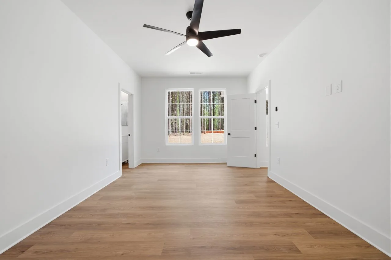 First-floor owner's suite — 1424 Quiver Way custom home, York SC