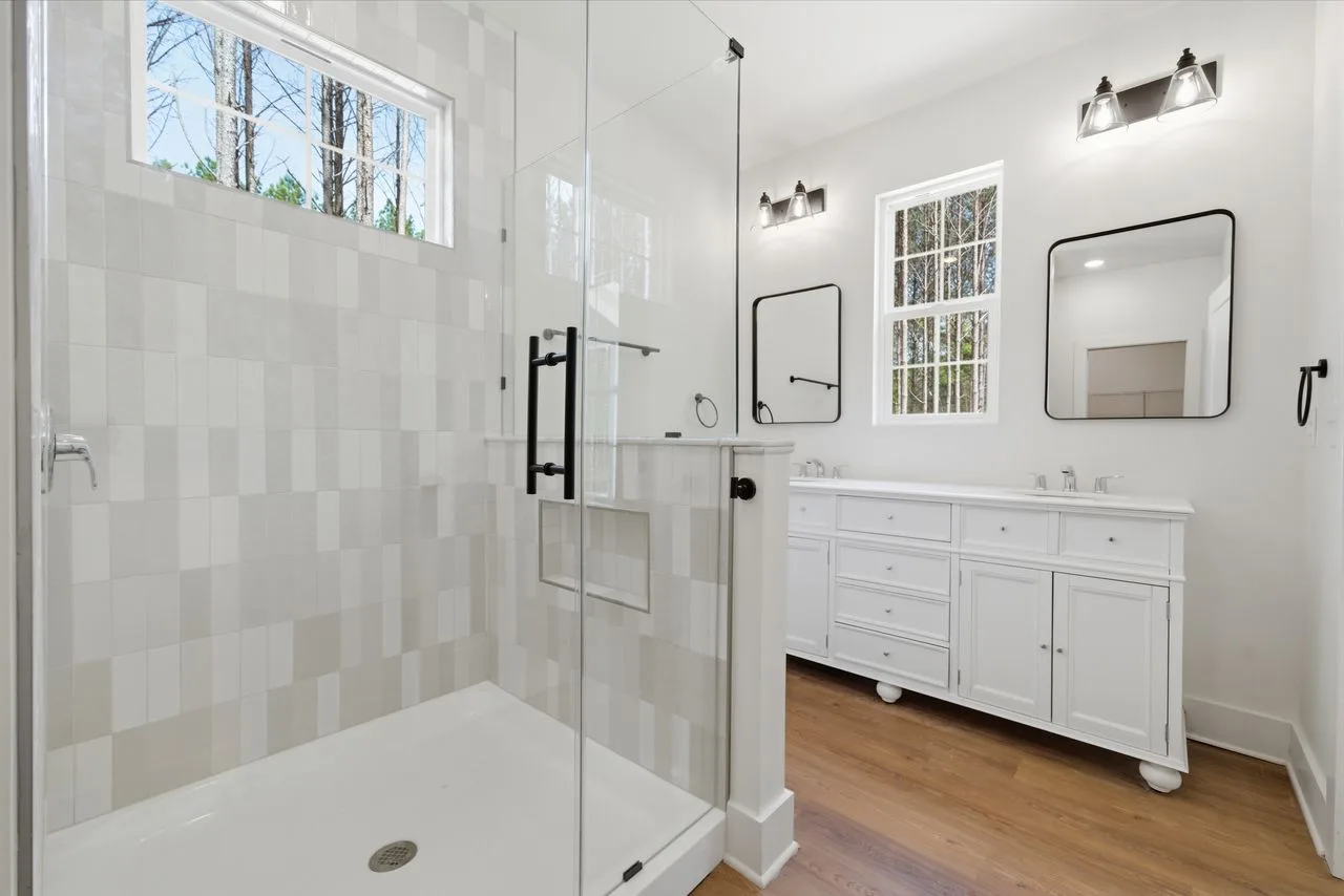 Owner's bath with tile shower and dual vanities — 1412 Quiver Way, York SC