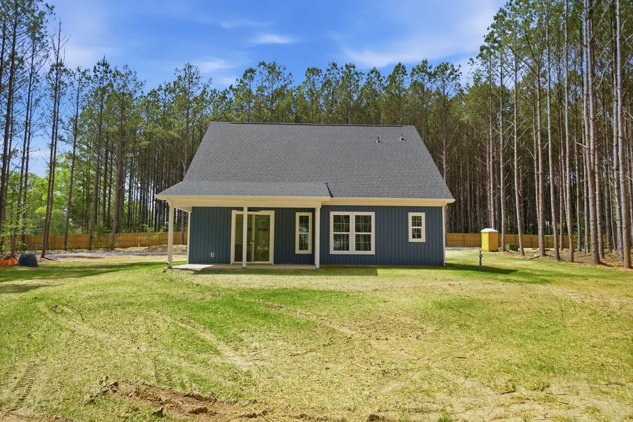 Rear exterior and covered back porch of 1412 Quiver Way custom home — York SC