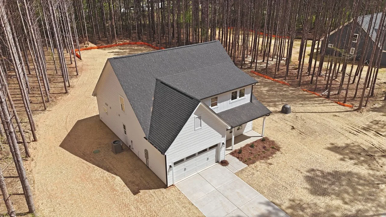 Aerial view of 1424 Quiver Way on 1.24 private wooded acres — York SC