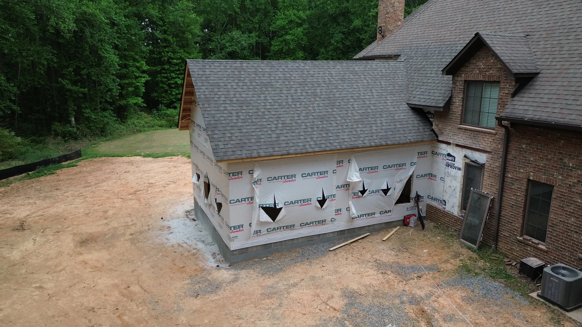 Aerial view of 645 SF great room addition alongside existing custom home — York County SC