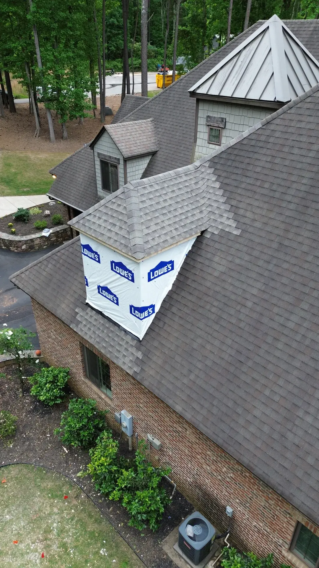 Aerial view of 57 SF dormer addition integrated into existing roofline — York County SC