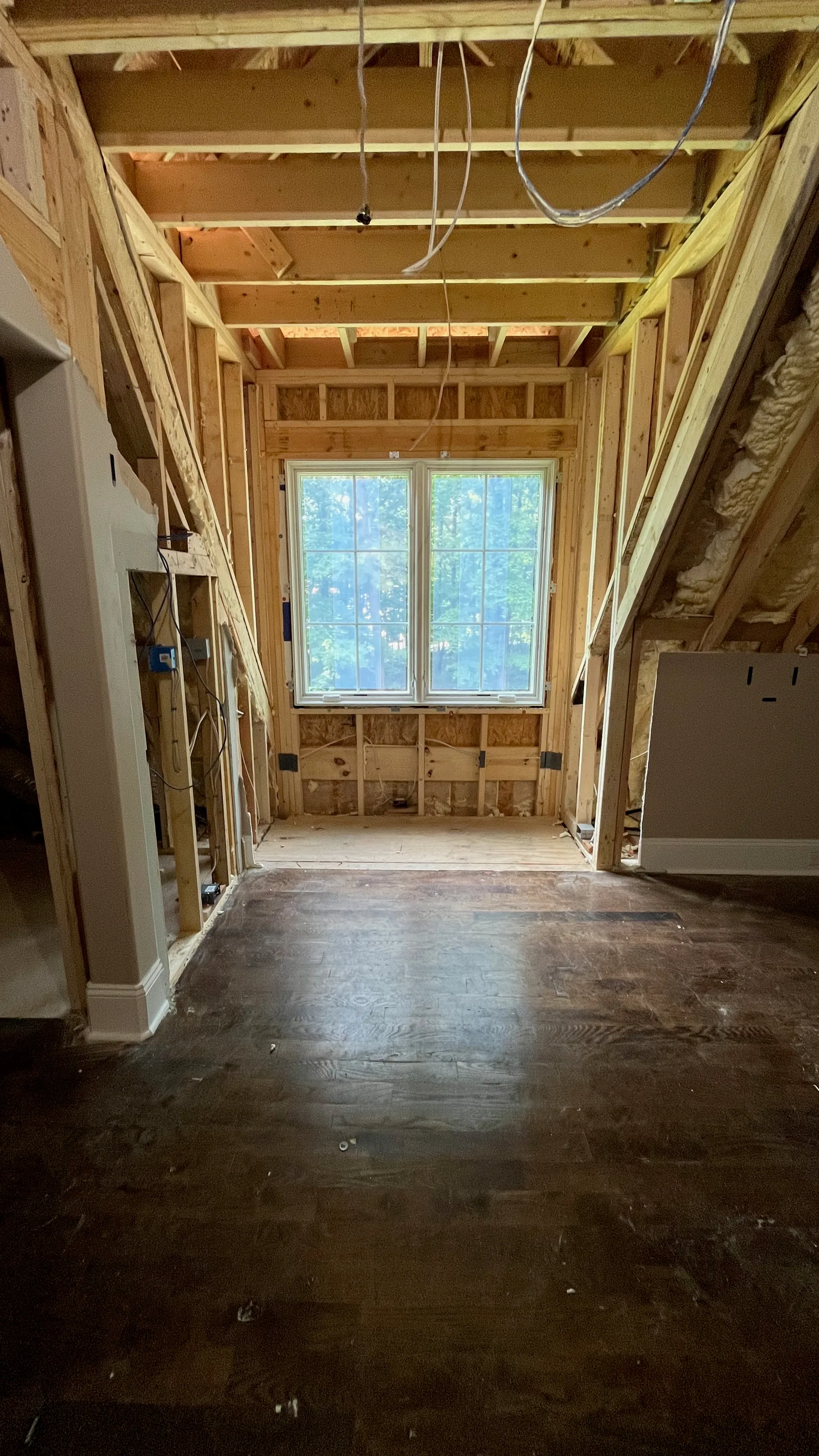 Interior dormer framing creating new fifth bedroom in existing roofline — York County SC