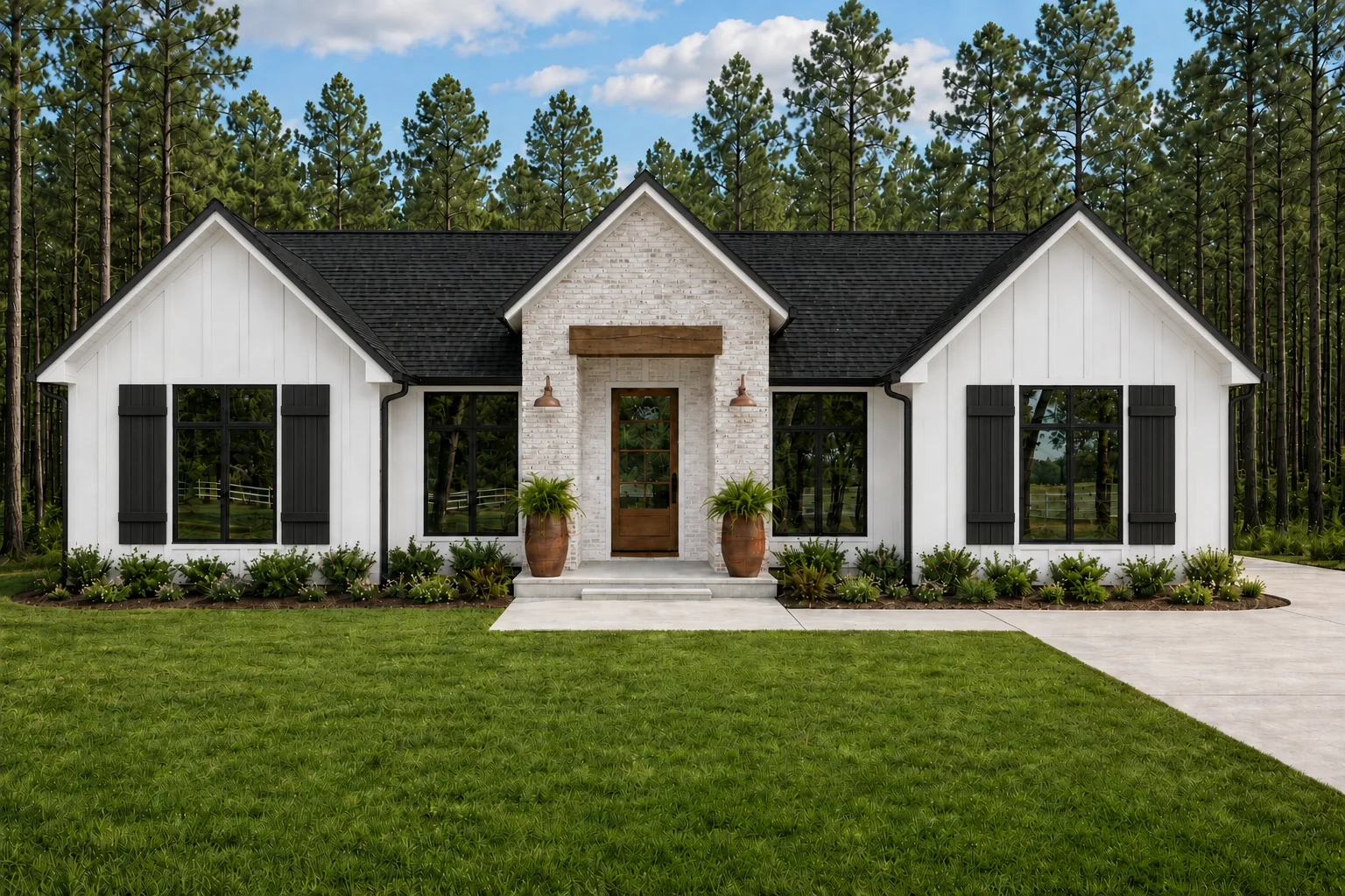 Front exterior of a contemporary ranch home with white board-and-batten siding, white brick entry, and black accents — York County SC