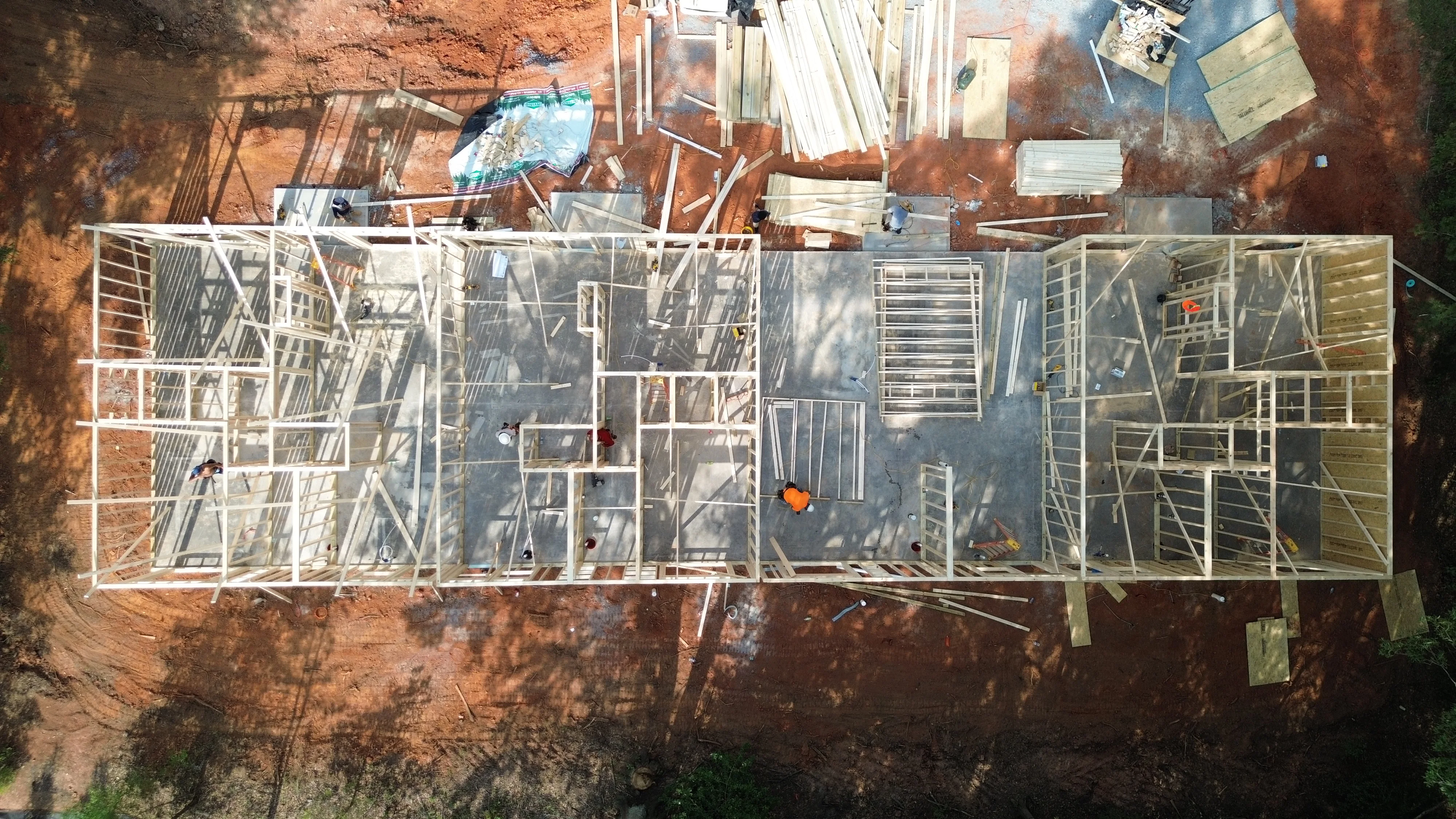 Landscape aerial view of Build-to-Hold quadplex framing and construction progress — Clover SC
